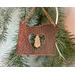Photo of Copper I Love Oregon Ornament with Heart shape cutout in the middle and an Oregon Sunstone gemstone hanging inside the heart cutout